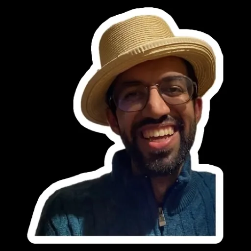Hridey in a straw hat, laughing